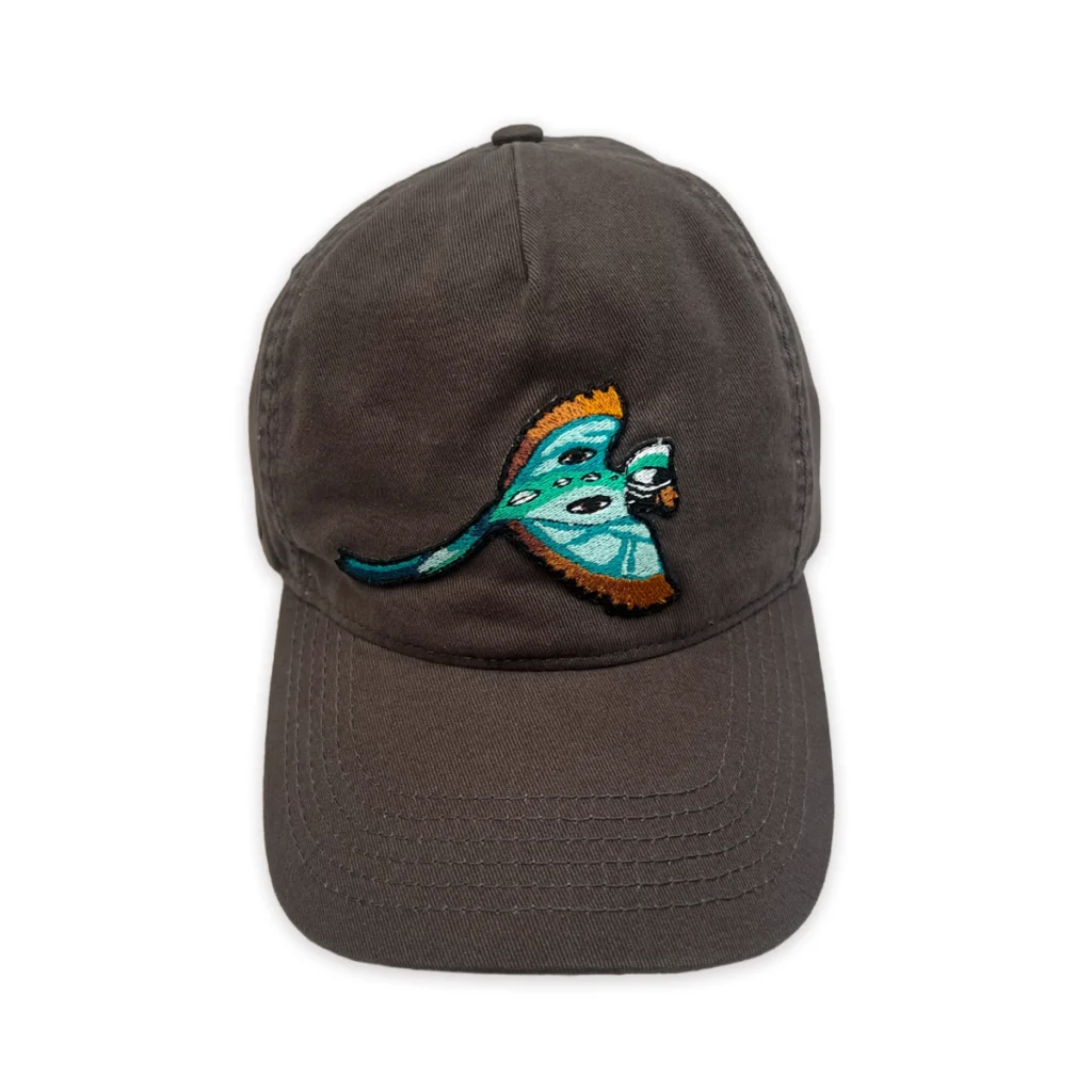 Cap featuring artwork by Ingrid Nuss Fine Art Gallery Wilderness Garden Route South Africa